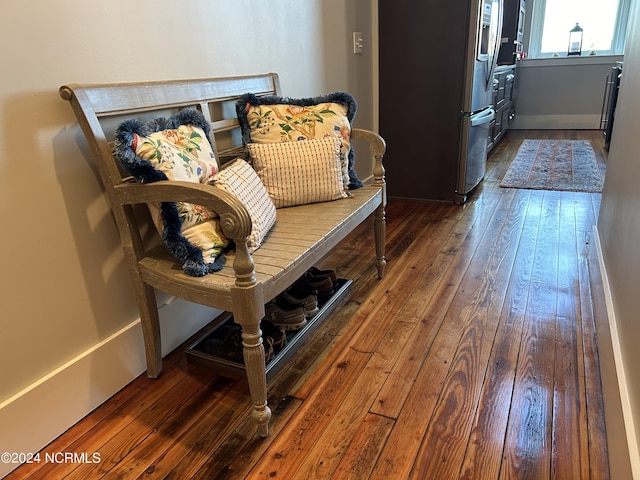 sitting room featuring dark hardwood / wood-style floors