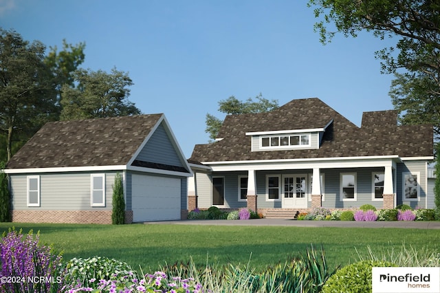 view of front facade featuring an attached garage, a porch, and a front yard