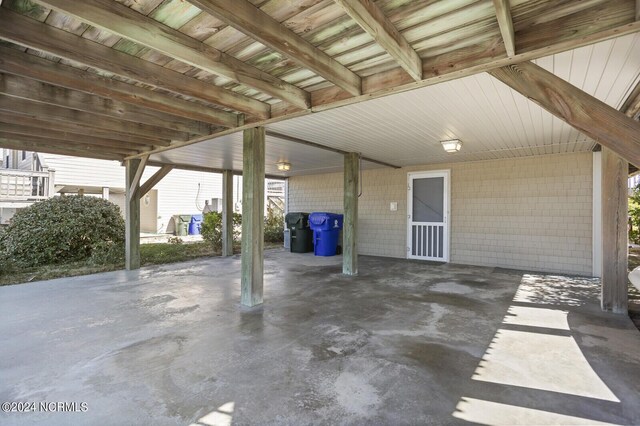 view of patio / terrace with a carport