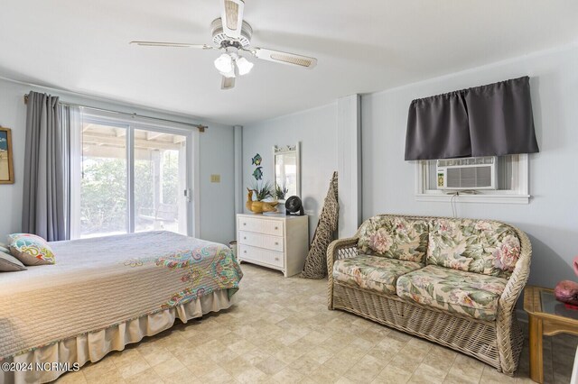 bedroom with ceiling fan, cooling unit, and access to exterior