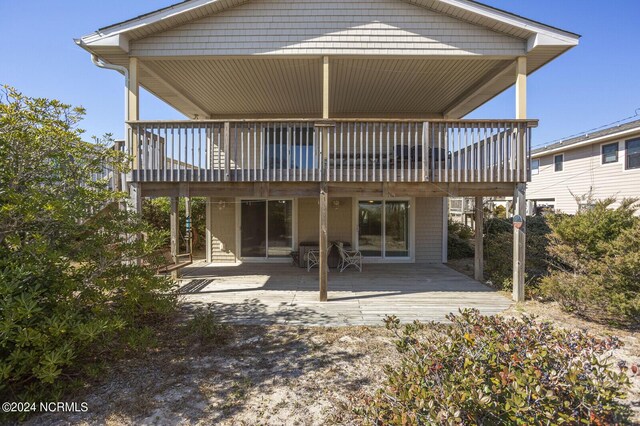 rear view of house with a deck