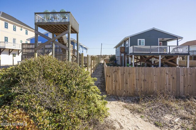 exterior space featuring a wooden deck