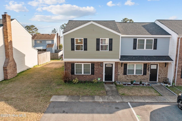 view of front of house with a front lawn