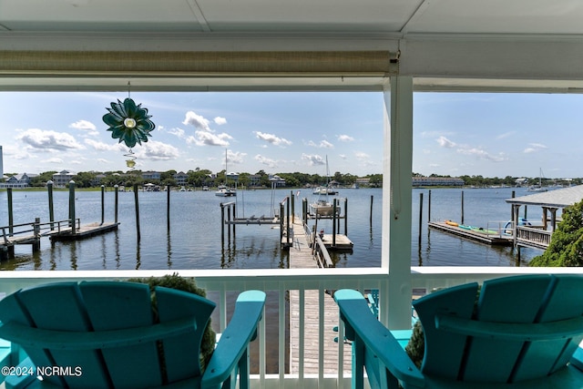 view of dock with a water view