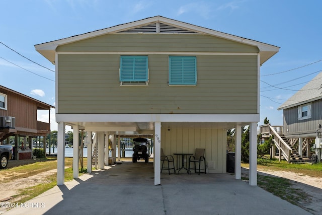 view of front of home featuring a carport