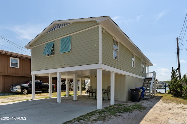 exterior space with a carport