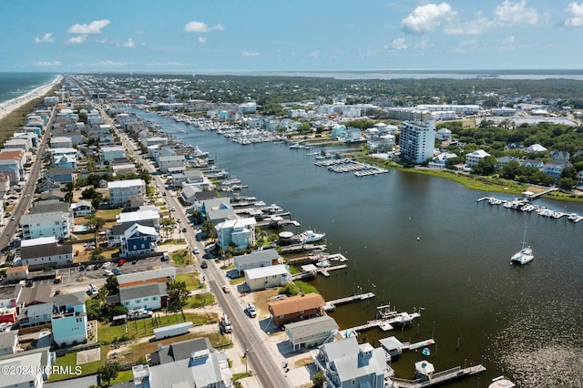 bird's eye view with a water view