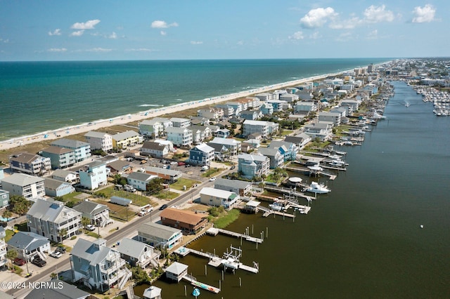 aerial view featuring a water view and a view of the beach