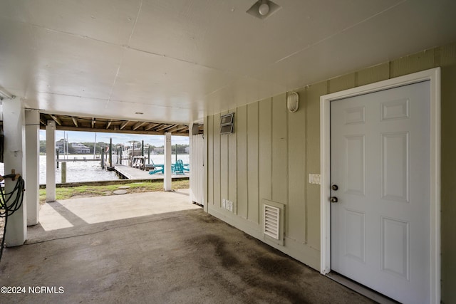 view of patio / terrace featuring a water view