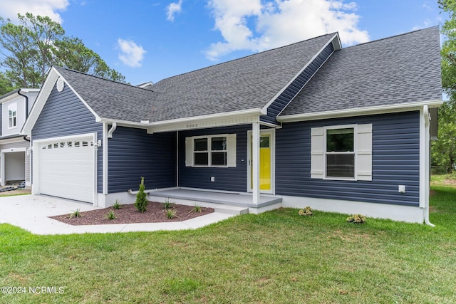 view of front of home with a porch, a garage, and a front lawn