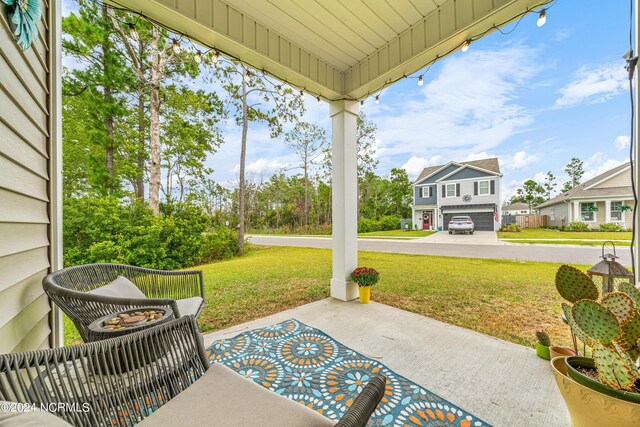 view of patio featuring a garage