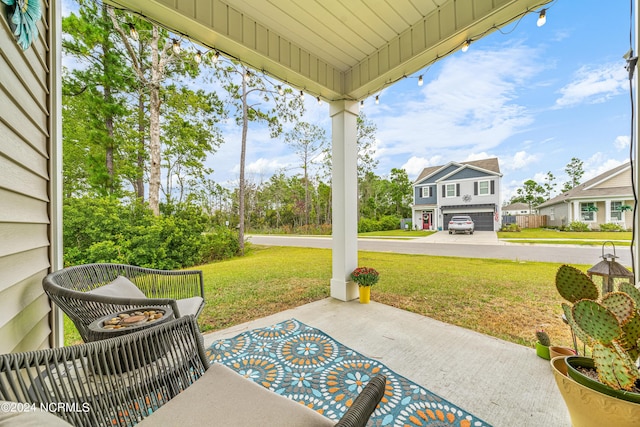 view of patio / terrace featuring a residential view
