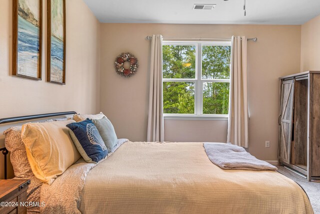 bedroom featuring carpet