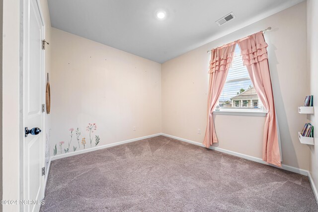 view of carpeted spare room