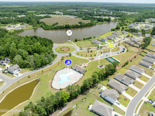 bird's eye view featuring a residential view and a water view