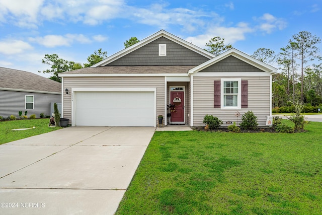 ranch-style house with a front yard, concrete driveway, and an attached garage