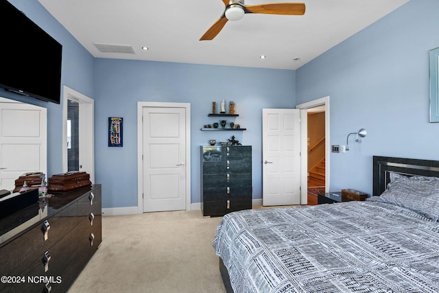 carpeted bedroom featuring ceiling fan