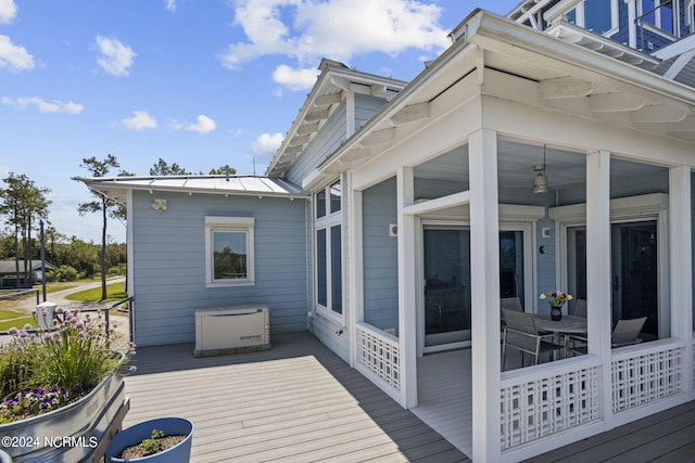 deck featuring a sunroom