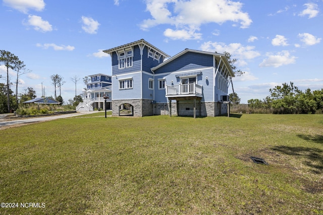 back of property featuring a lawn and central AC unit