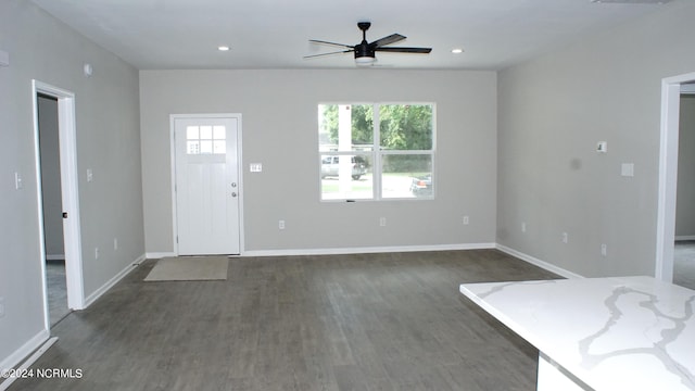 entrance foyer featuring ceiling fan and dark hardwood / wood-style flooring