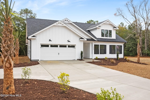 modern farmhouse style home with a garage