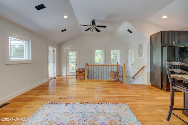 interior space featuring vaulted ceiling, light hardwood / wood-style flooring, and ceiling fan