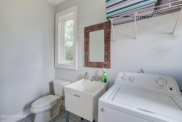 laundry area with sink and washer / dryer