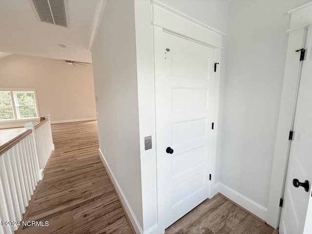 hallway featuring hardwood / wood-style floors