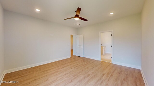 unfurnished bedroom featuring light wood finished floors, ceiling fan, baseboards, and recessed lighting