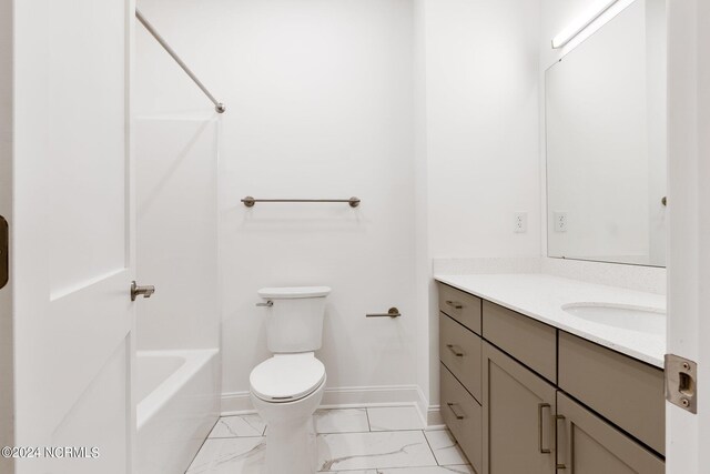 383 James St, Vass, NC 28394 - full bath featuring vanity, baseboards, shower / tub combination, toilet, and marble finish floor