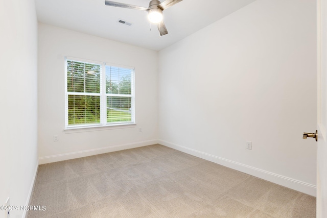383 James St, Vass, NC 28394 - unfurnished room with visible vents, light carpet, baseboards, and a ceiling fan