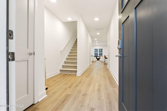 383 James St, Vass, NC 28394 - entrance foyer featuring light wood finished floors, visible vents, baseboards, stairway, and recessed lighting