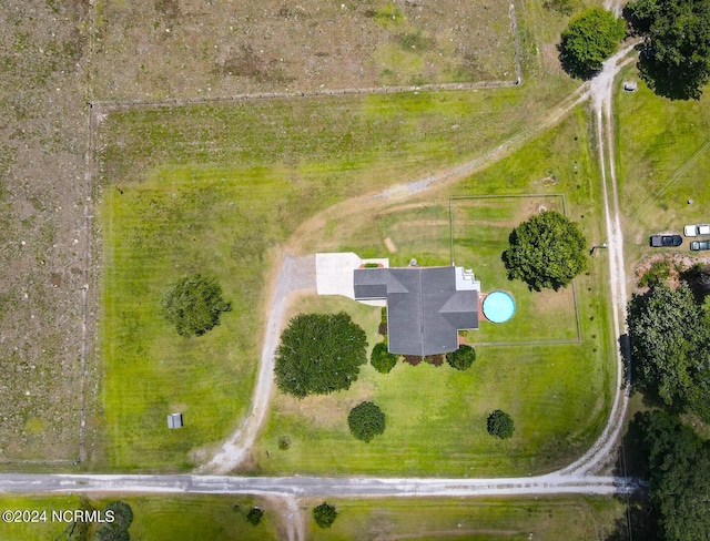 birds eye view of property featuring a rural view