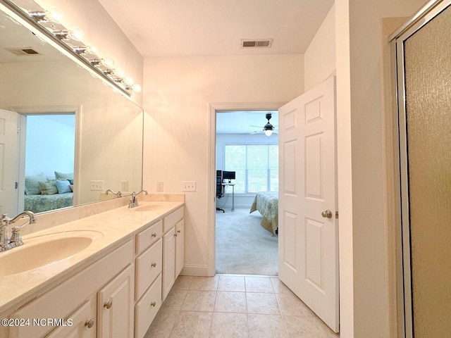 bathroom featuring ceiling fan, tile patterned floors, and vanity