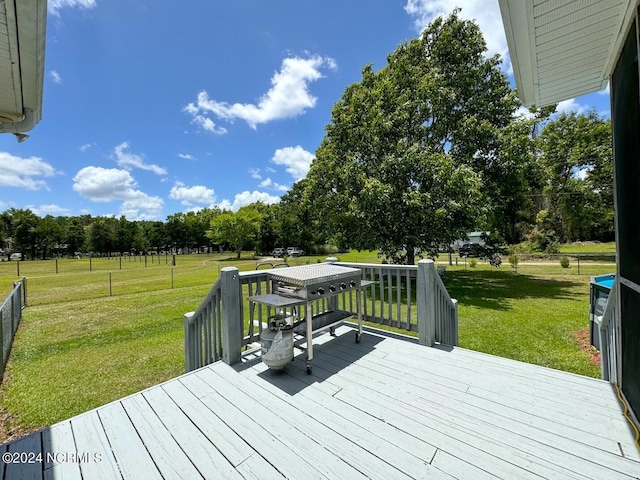 deck featuring a lawn