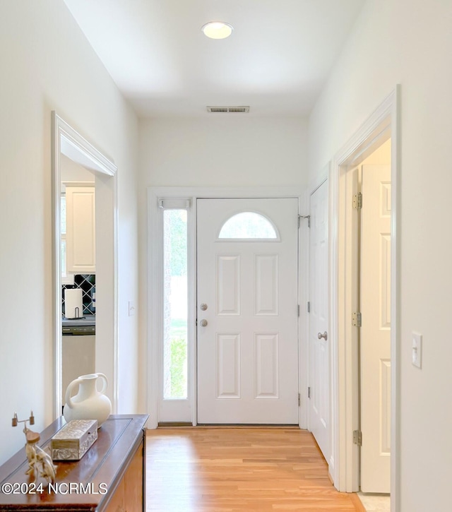 entrance foyer with light hardwood / wood-style floors