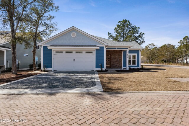 single story home with a garage