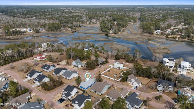 bird's eye view with a water view and a residential view