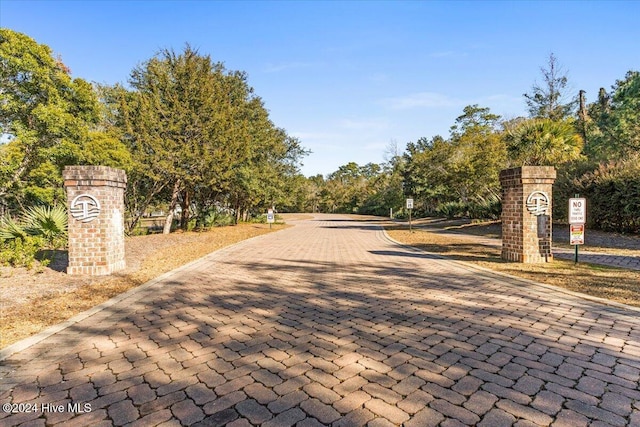 view of road featuring curbs