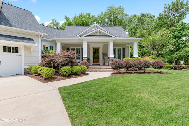 craftsman house with a front lawn