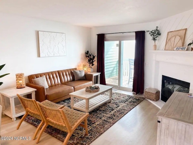 living room with light hardwood / wood-style flooring