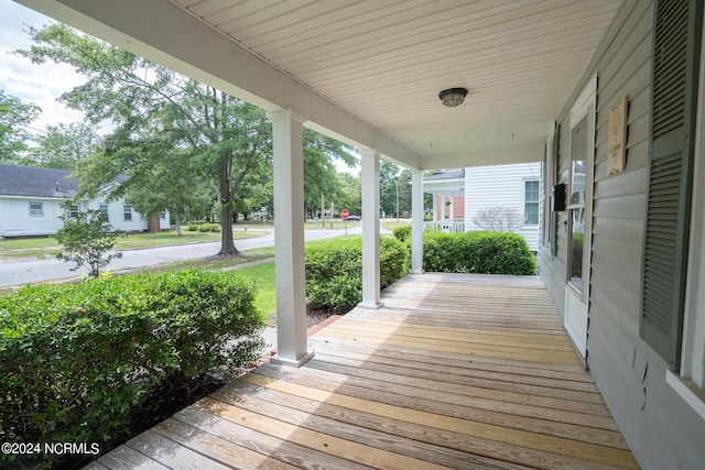 wooden terrace with covered porch