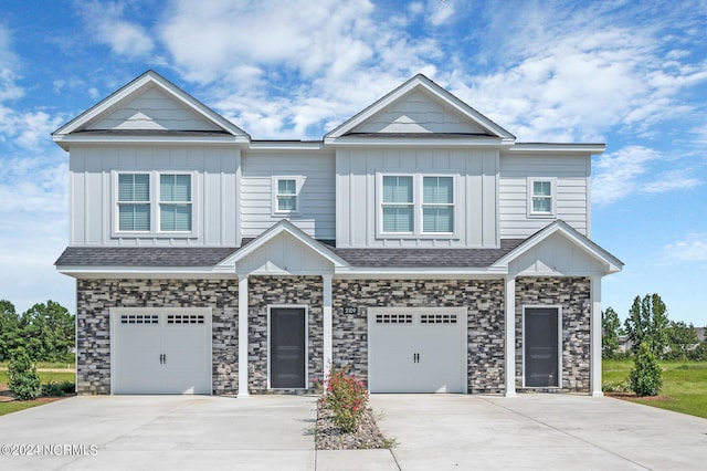 craftsman inspired home with a garage