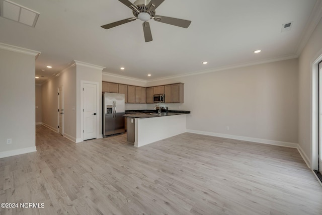 kitchen with ornamental molding, stainless steel appliances, ceiling fan, sink, and light hardwood / wood-style floors