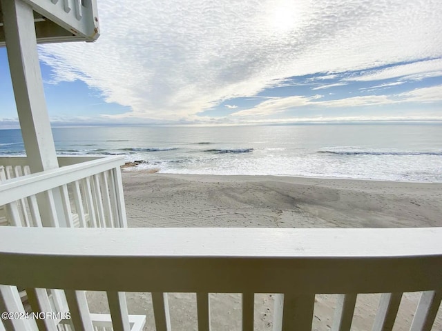 view of water feature with a beach view