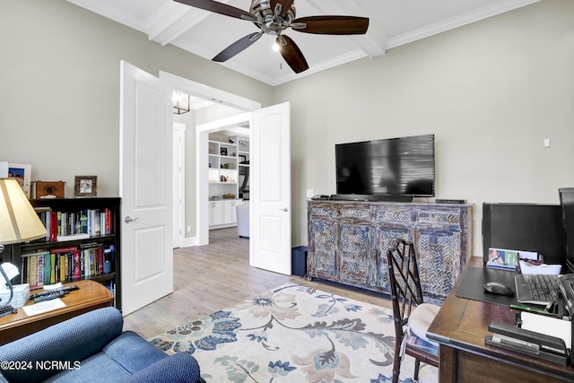 office space featuring crown molding, wood finished floors, beam ceiling, and a ceiling fan