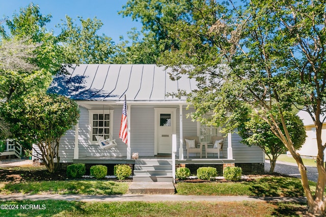 view of front of house with covered porch