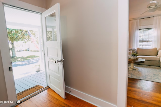 entryway featuring hardwood / wood-style flooring and ceiling fan