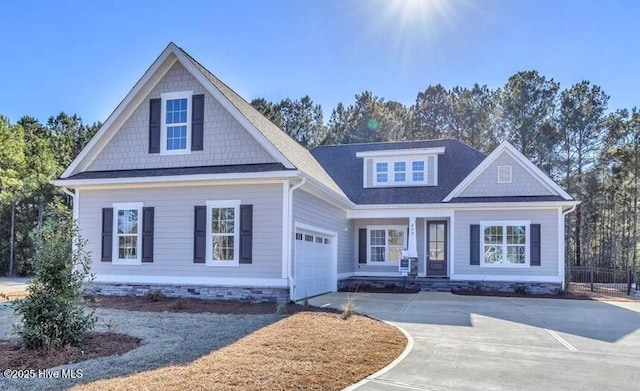 craftsman-style house featuring a garage