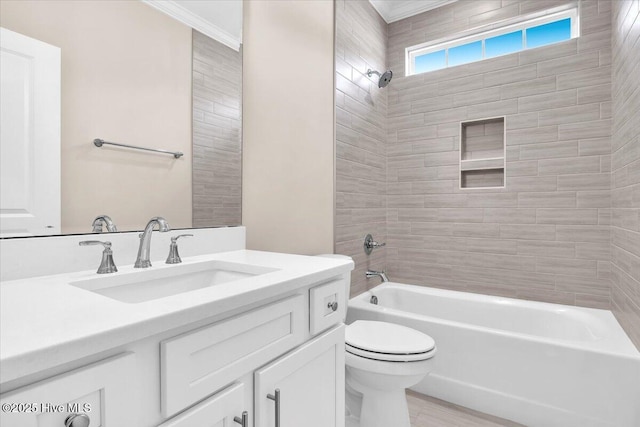 full bath featuring crown molding, bathing tub / shower combination, toilet, and vanity